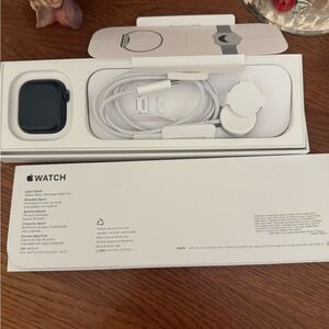 Apple Watch Sport Band in Space Black and White Packaging